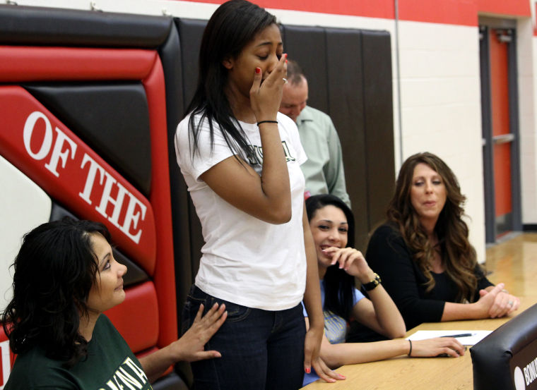 Heights volleyball duo sign with DI schools